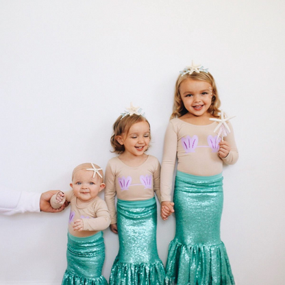 3 Girls in Nude Mermaid leotards.